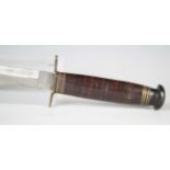 A mid-20th century fighting knife by J.O. James & Sons Ltd, Sheffield, with straight double-edged