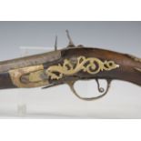 An 18th century and later Continental flintlock pistol with engraved barrel, barrel length 34cm (