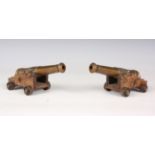 A pair of George VI period model cannons, the cast brass barrels detailed with the cypher of