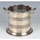 A George V silver two-handled syphon stand with scroll and scallop shell rim above pierced