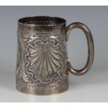 A late Victorian silver christening tankard, the tapering cylindrical body decorated in relief and