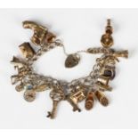 A silver gilt curblink charm bracelet, fitted with a variety of mostly silver gilt pendants and