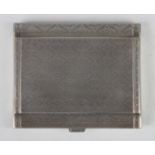 A George V silver rectangular cigarette case with engine turned decoration, import mark London