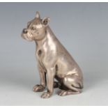 A Continental silver-filled figure of a seated boxer dog, detailed '925', height 13.2cm.Buyer’s