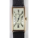 A 9ct gold curved rectangular cased gentleman's wristwatch, the jewelled movement detailed 'J.W.