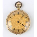An 18ct gold cased keyless wind open-faced lady's fob watch with unsigned gilt jewelled cylinder