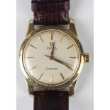 An Omega Seamaster gilt metal fronted and steel backed gentleman's wristwatch, circa 1958, the