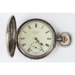 A Victorian silver keyless wind hunting cased pocket watch, the gilt three-quarter plate movement