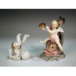 A Sitzendorf porcelain Meissen style model of Cupid riding a dolphin, late 19th century, blowing a