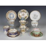 A collection of English porcelain cups and saucers, 19th century, including a Spode bute shaped