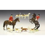 A group of Beswick hunt figures, comprising Huntsman, model No. 1501, Huntsman on rearing horse,