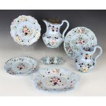 A small group of Ridgway blue glazed pottery, 1830-40, enamelled and gilt with flowers and