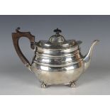 An Edwardian silver oval teapot with gadrooned rim, on ball feet, Sheffield 1903 by William Hutton &