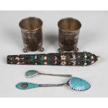 A pair of Russian silver beakers, 84 zolotnik, each of cylindrical form, decorated with Cyrillic