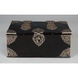 A 19th century silver mounted rectangular tortoiseshell box, the hinged lid and sides applied with