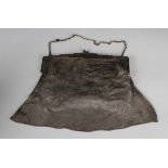 A George V silver chain mesh evening purse, the clasp with pierced floral decoration and acorn