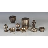 A small group of early 20th century Iraqi silver niello ware, including a cylindrical box and cover,