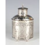 An early 20th century Dutch silver tea caddy of oval form with domed shoulders and cylindrical