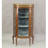 An early 20th century French mahogany and gilt metal mounted vitrine, the rouge marble top with a