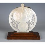 A late 19th century carved and pierced mother-of-pearl shell, depicting the birth of Christ and