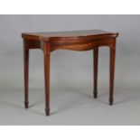 A George III mahogany serpentine fronted fold-over card table with boxwood stringing, height 72cm,