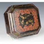A 19th century Chinese lacquer games box of canted rectangular form, gilt decorated with figures and