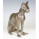 An early 20th century green patinated cast bronze model of an Egyptian cat, unsigned, height 26cm.