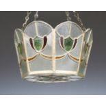 An early 20th century Arts and Crafts Glasgow School stained and leaded glass ceiling light of