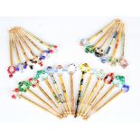 A large collection of 20th century lace making bobbins, mostly turned wood with paste beads and
