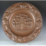 An impressive late Victorian Arts and Crafts patinated copper 'Tree of Life' charger by John