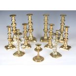 A group of mainly Victorian brasswares, including four pairs of ejector candlesticks, three other