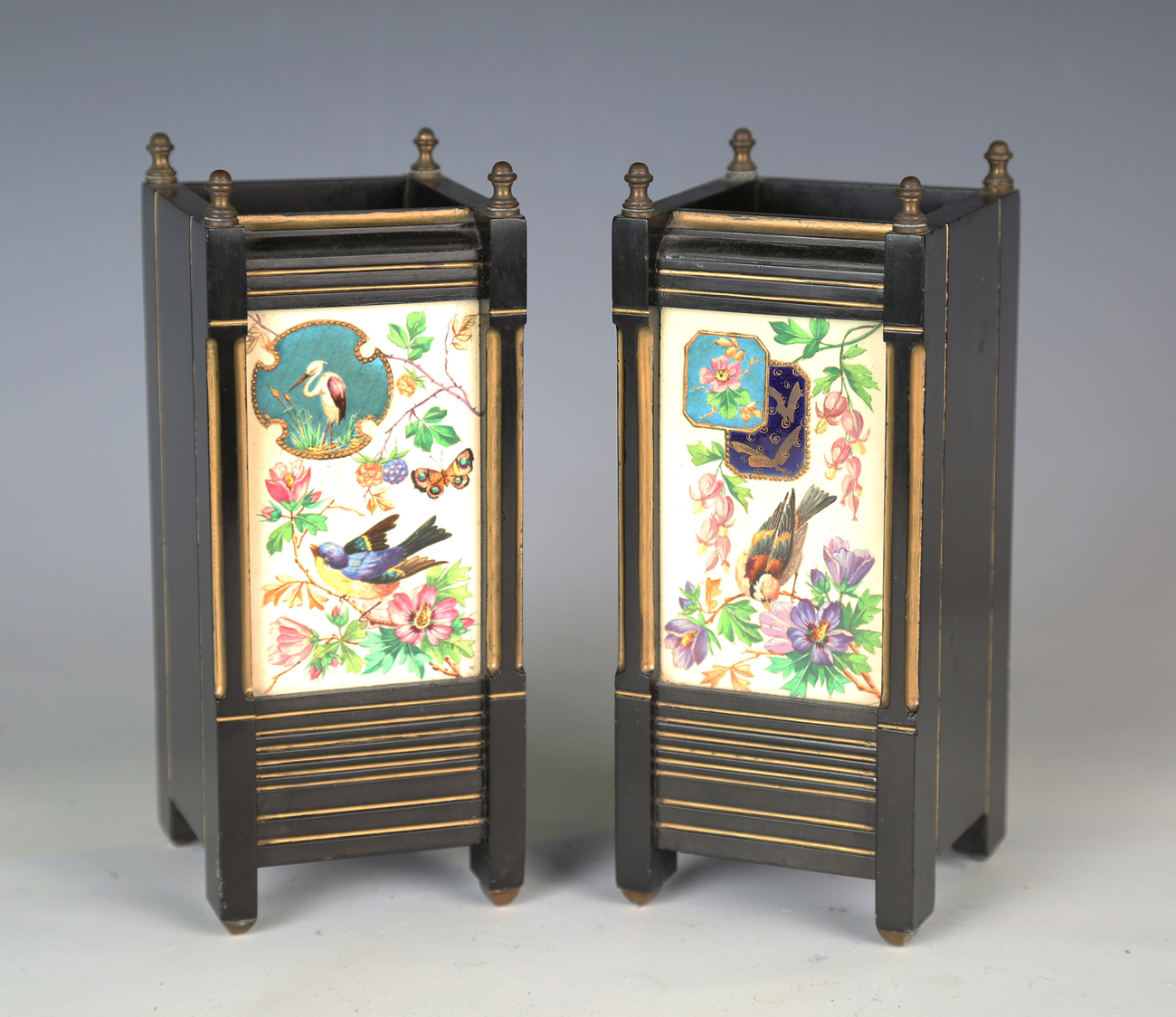 A pair of late Victorian Aesthetic Movement slate and gilt decorated mantel vases, each front