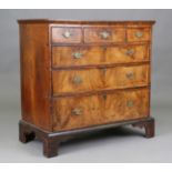 A George II provincial walnut chest, the elm top above crossbanded drawers, on bracket feet,