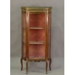 An early 20th century French mahogany and gilt metal mounted vitrine, the rouge marble top with a