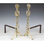 A pair of 19th century cast brass fire andirons, each modelled in the form of a caduceus staff, on