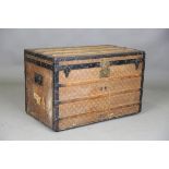 A late 19th/early 20th century Louis Vuitton travelling trunk with overall monogram and quatrefoil
