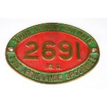 A South African Railways brass cabside number plate, detailed '2691 19D', with dual language,