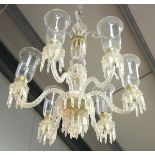 An impressive pair of 20th century clear cut glass five-light chandeliers, fitted with glass