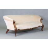 A mid-Victorian tub back settee, upholstered in velour and raised on carved cabriole legs and