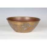 An early 20th century Arts and Crafts copper and silver overlaid bowl by Heinz, bearing maker's mark