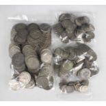 A large collection of British pre-1947 silver coinage, comprising half-crowns, florins, shillings