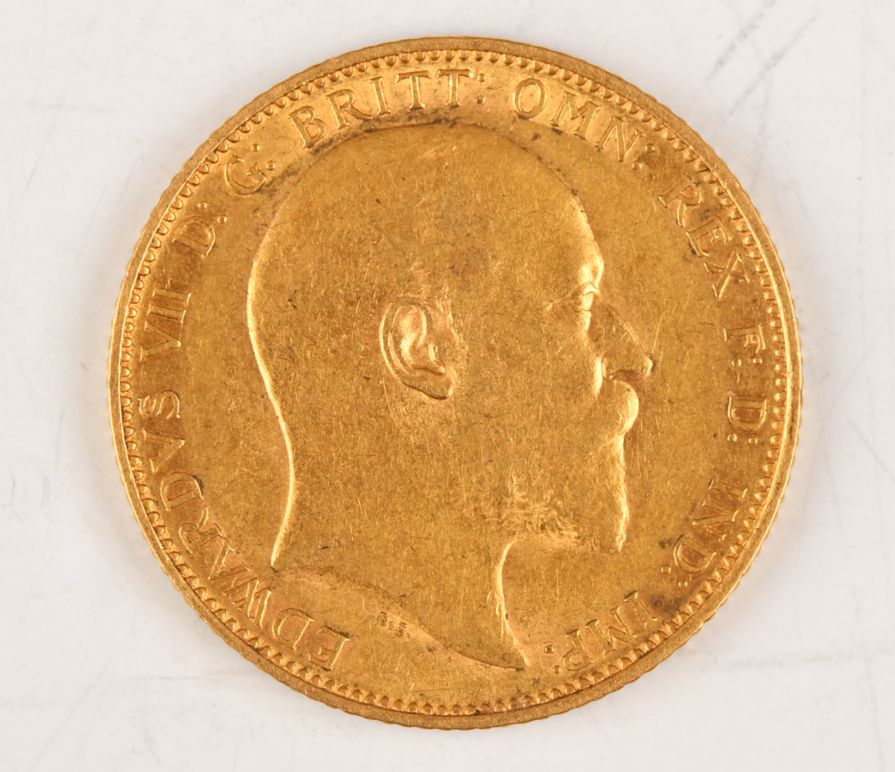 An Edward VII sovereign 1904.Buyer’s Premium 29.4% (including VAT @ 20%) of the hammer price. Lots