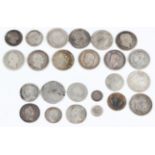 A small collection of 18th and 19th century silver coinage, including a George I shilling 1723 South