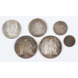 A small group of European and world coins, including two France ten francs, 1965 and 1966, and an