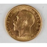 A George V sovereign 1914.Buyer’s Premium 29.4% (including VAT @ 20%) of the hammer price. Lots