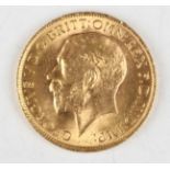 A George V sovereign 1915.Buyer’s Premium 29.4% (including VAT @ 20%) of the hammer price. Lots