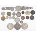 A group of British and foreign coins, including a George III threepence 1762, a Victoria half-
