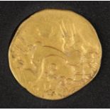 A Gallo-Belgic Ambiani gold broad flan stater, circa 150 BC, obverse with stylized head of Apollo,