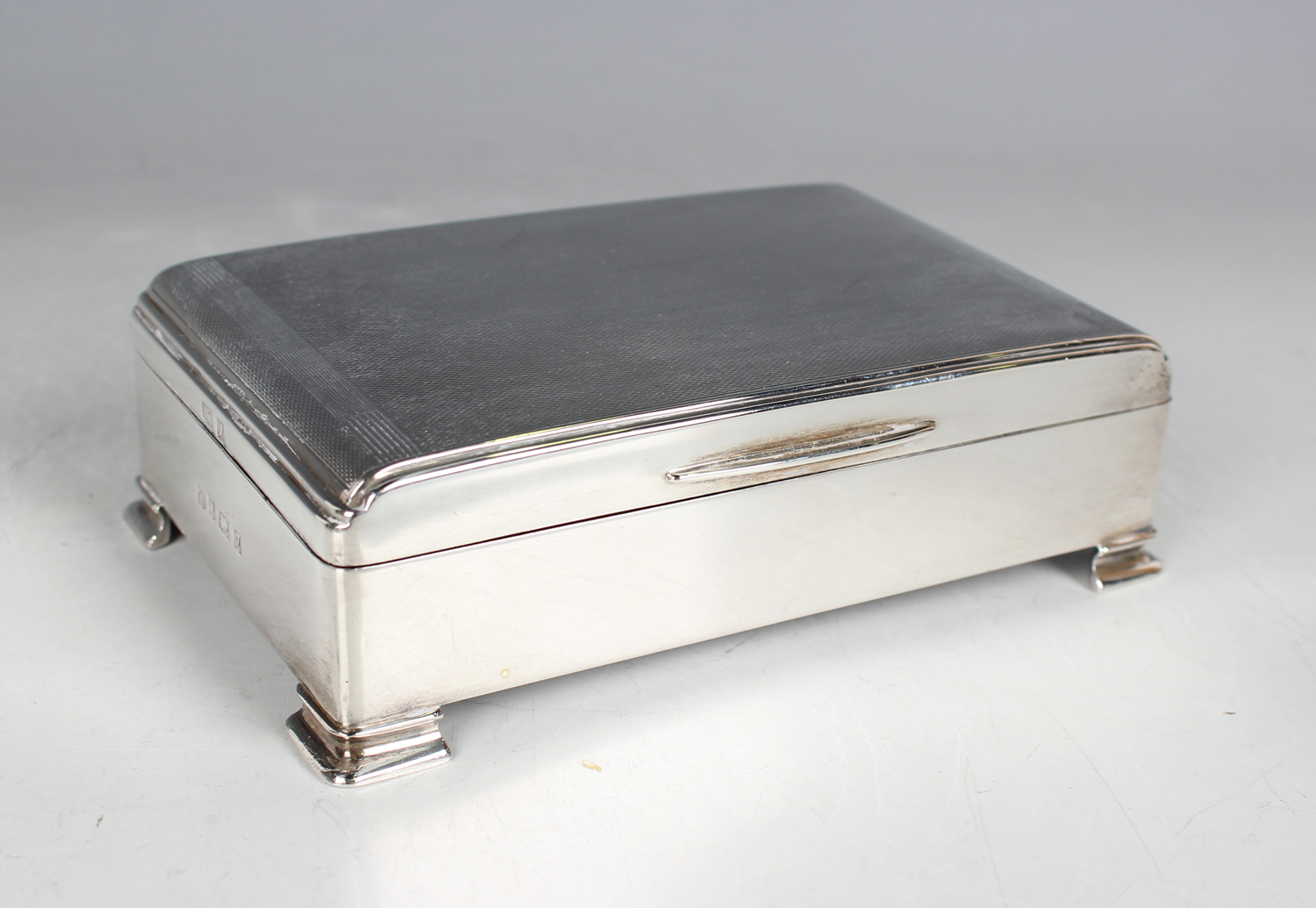 An Elizabeth II silver square cigarette box with geometric engine turned hinged lid, Birmingham 1954 - Image 4 of 7