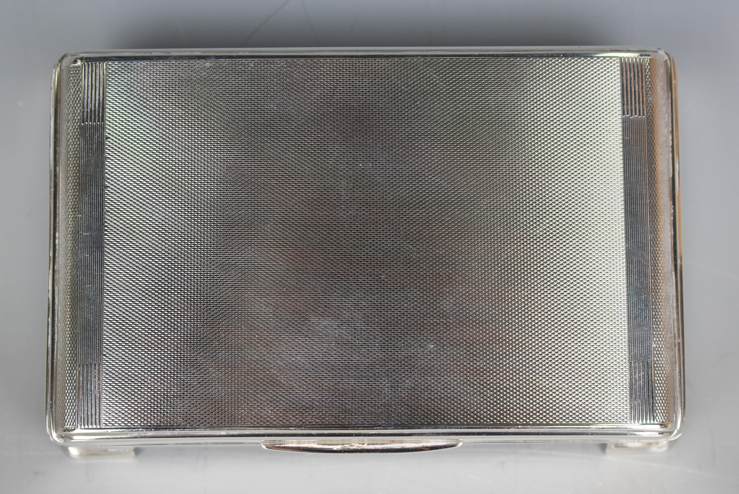 An Elizabeth II silver square cigarette box with geometric engine turned hinged lid, Birmingham 1954 - Image 3 of 7